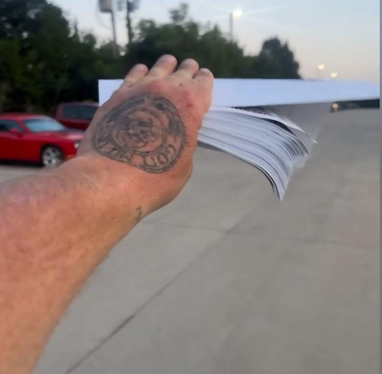 Louie Dunn sieg heil with GDL flyers