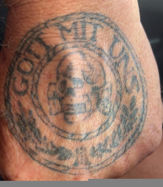 Louie Dunn hand tattoo “GOTT MIT UNS”